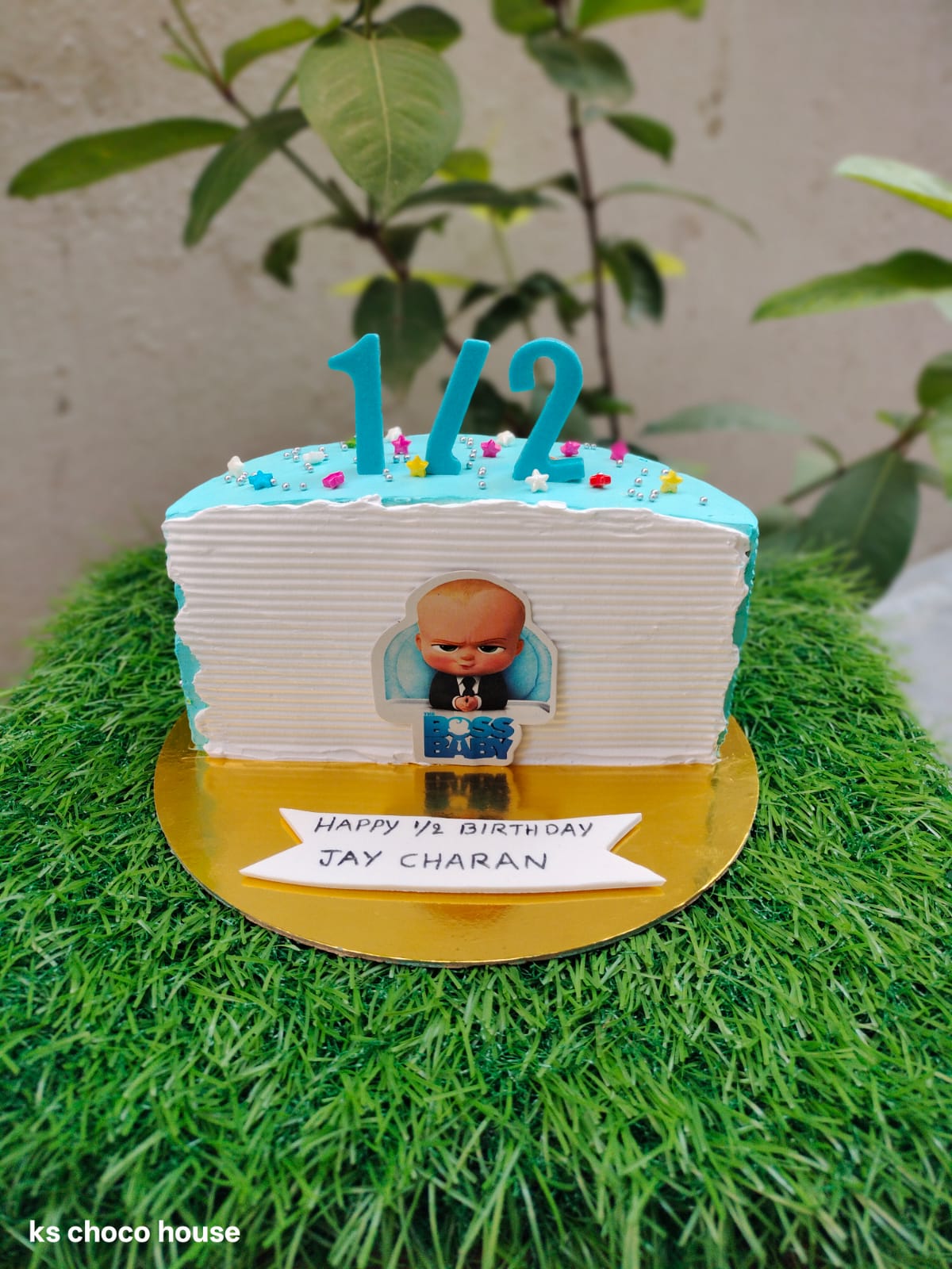 Boss baby half birthday cake